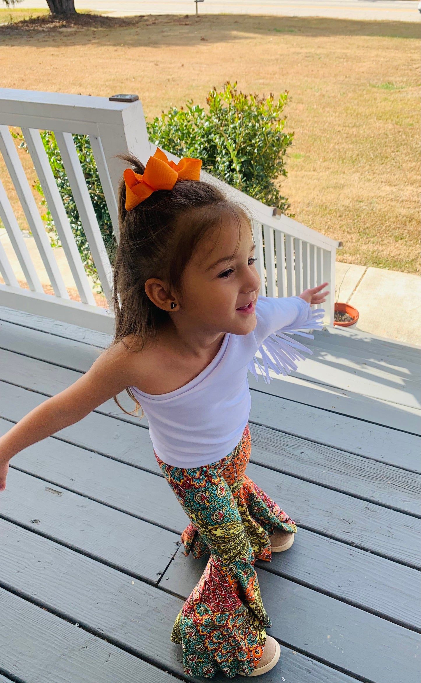 Retro Vibes: Bell Bottom Pants & One Shoulder Fringe Top for Kids - Trendy and Comfortable Outfit for Dancing and Playtime! WHOLESOME GOODS